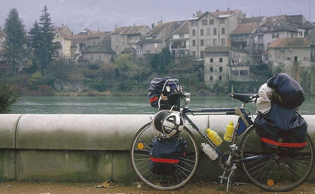 Old touring bike on the riverside